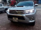 Cần bán Toyota Hilux 3.0G 4x4 AT đời 2015, màu bạc, nhập khẩu 