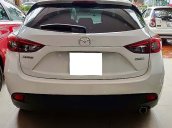 Cần bán Mazda 3 1.5 AT sản xuất năm 2015, màu trắng, số tự động