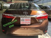 Cần bán Toyota Corolla sản xuất 2016, màu nâu như mới