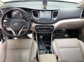 Bán Hyundai Tucson 1.6Turbo màu đen VIP số tự động sản xuất 2017 mới 90%