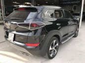Bán Hyundai Tucson 1.6Turbo màu đen VIP số tự động sản xuất 2017 mới 90%