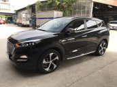 Bán Hyundai Tucson 1.6Turbo màu đen VIP số tự động sản xuất 2017 mới 90%
