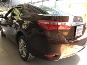 Cần bán Toyota Corolla sản xuất 2016, màu nâu như mới