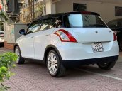 Bán Suzuki Swift 1.4 AT đời 2015, màu trắng, chính chủ