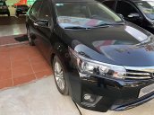 Cần bán lại Toyota Corolla Altis 1.8G AT đời 2015, màu đen, chính chủ 