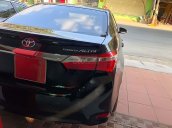 Cần bán lại Toyota Corolla Altis 1.8G AT đời 2015, màu đen, chính chủ 