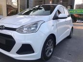 Cần bán Hyundai Grand i10 1.0 MT Base 2015, màu trắng, nhập khẩu