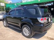 Bán Toyota Fortuner G đời 2014, màu đen số sàn, 700 triệu