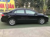 Bán Toyota Corolla Altis đời 2010, màu đen xe còn mới lắm