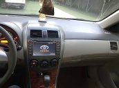 Bán Toyota Corolla Altis đời 2010, màu đen xe còn mới lắm