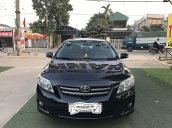 Bán Toyota Corolla Altis đời 2010, màu đen xe còn mới lắm