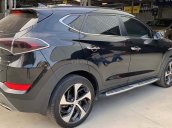 Bán ô tô Hyundai Tucson sản xuất 2017, màu đen số tự động, giá tốt xe còn mới lắm