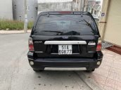 Cần bán lại xe Ford Escape năm 2004 2.3L màu đen, xe gia đình