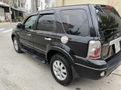 Cần bán lại xe Ford Escape năm 2004 2.3L màu đen, xe gia đình