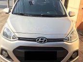 Cần bán xe Hyundai Grand i10 1.0AT năm 2015, màu bạc, xe nhập