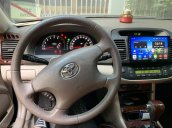 Bán xe Toyota Camry năm 2003, màu đen, liên hệ 0936637166