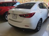 Bán Mazda 2 sản xuất 2017, màu trắng số tự động xe còn mới lắm