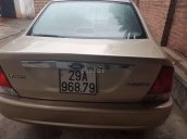 Bán Ford Laser 2002, màu vàng, xe nhập