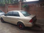 Bán Ford Laser 2002, màu vàng, xe nhập