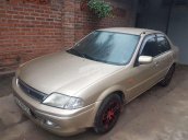 Bán Ford Laser 2002, màu vàng, xe nhập