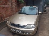 Bán Ford Laser 2002, màu vàng, xe nhập