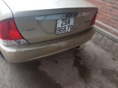 Bán Ford Laser 2002, màu vàng, xe nhập