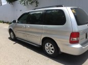 Gia đình cần bán Kia Carnival đời 2006, màu bạc, nhập khẩu nguyên chiếc