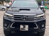 Cần bán Toyota Hilux 3.0AT 2016, màu đen, nhập khẩu