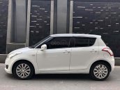 Cần bán lại xe Suzuki Swift 1.4 AT đời 2016, màu trắng