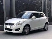Cần bán lại xe Suzuki Swift 1.4 AT đời 2016, màu trắng