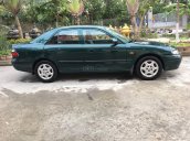 Cần bán Mazda 626 sx 1999, màu xanh