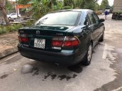 Cần bán Mazda 626 sx 1999, màu xanh