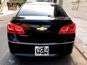 Cần bán gấp Chevrolet Cruze LT sản xuất năm 2015, màu đen xe gia đình