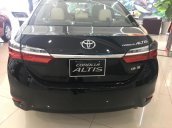 Hỗ trợ giao xe nhanh toàn quốc chiếc xe Toyota Corolla Altis 1.8E MT, sản xuất 2020, màu đen, giá mềm