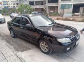 Cần bán Mazda 323 đời 2005, màu đen, nhập khẩu nguyên chiếc, giá chỉ 125 triệu