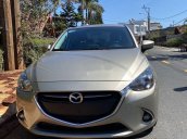 Xe Mazda 2 năm 2016, màu vàng, giá tốt