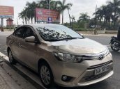 Cần bán Toyota Vios sản xuất 2016, màu vàng xe gia đình