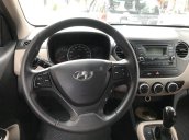 Cần bán gấp Hyundai Grand i10 2015, màu trắng, nhập khẩu nguyên chiếc xe gia đình