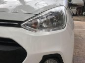 Cần bán gấp Hyundai Grand i10 2015, màu trắng, nhập khẩu nguyên chiếc xe gia đình