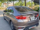 Cần bán lại xe Honda City TOP đời 2017, màu nâu