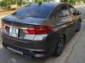 Cần bán lại xe Honda City TOP đời 2017, màu nâu