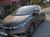 Cần bán lại xe Honda City TOP đời 2017, màu nâu 