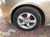 Cần bán Mitsubishi Grandis năm 2006, màu vàng cát