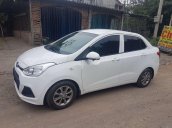 Cần bán Hyundai Grand i10 năm 2016, màu trắng, nhập khẩu nguyên chiếc số sàn