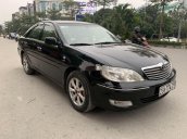 Bán Toyota Camry MT đời 2002, màu đen