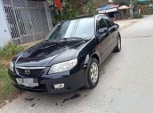 Bán Mazda 323 sản xuất năm 2003, màu đen, giá 135tr