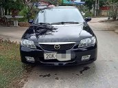 Bán Mazda 323 sản xuất năm 2003, màu đen, giá 135tr