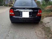 Bán Mazda 323 sản xuất năm 2003, màu đen, giá 135tr