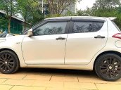 Cần bán Suzuki Swift sản xuất 2015, màu trắng