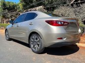 Cần bán Mazda 2 2016, màu vàng, 450tr